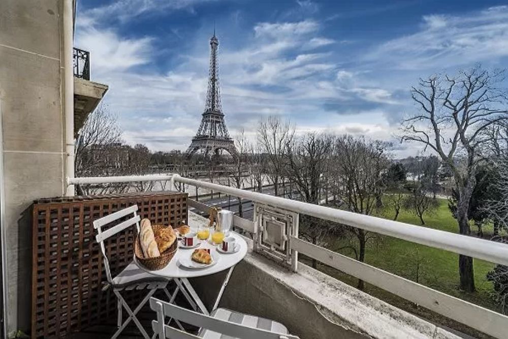 Enjoy The View of The Eiffel Tower from These Paris Luxury Apartments