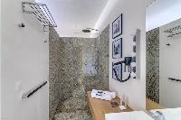 awesome mosaic bathroom walls of Corsica - Villa Algajola luxury apartment
