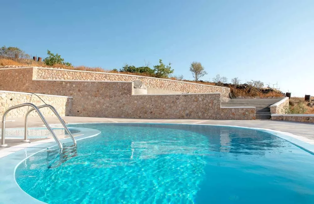 cool swimming pool of Santorini Moonlight luxury apartment, perfect vacation rental