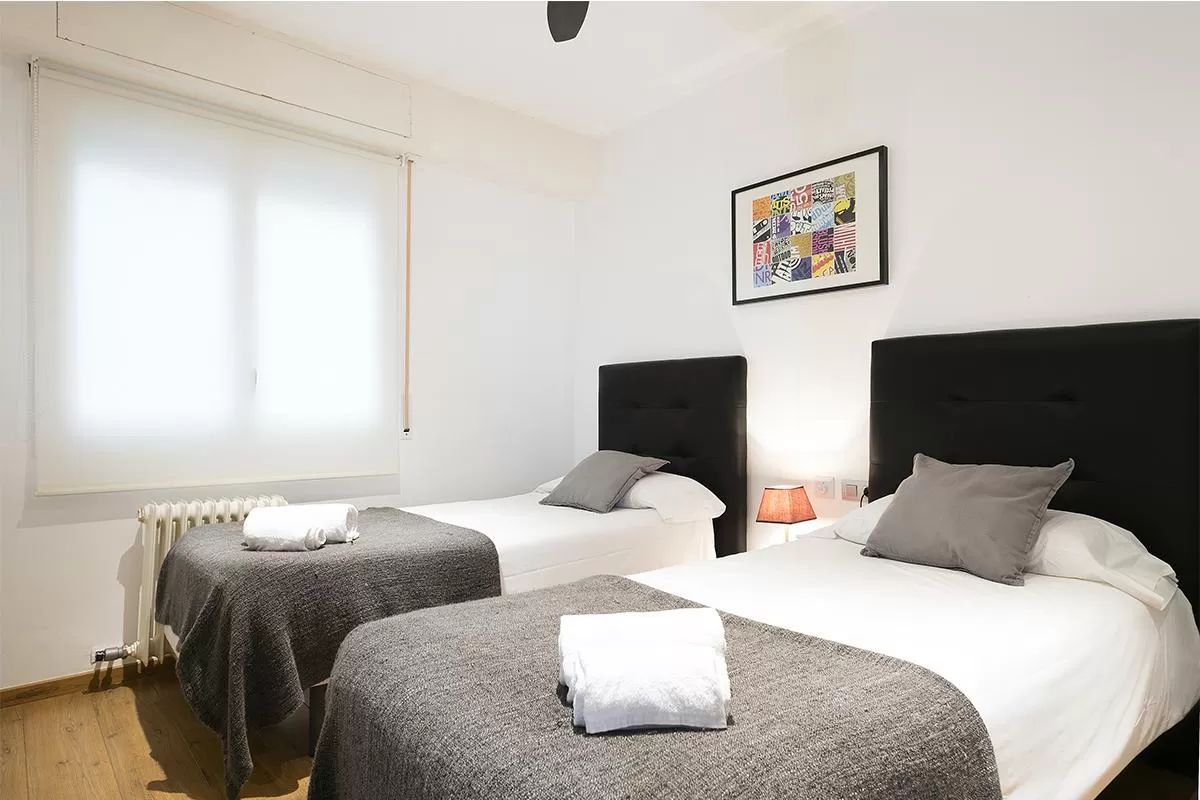 fresh and clean bedroom linens in Barcelona Eixample - Bruc luxury apartment