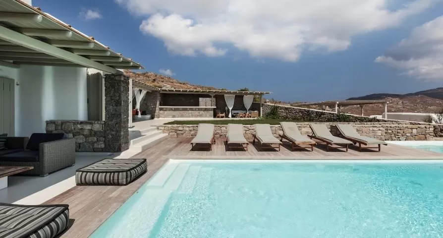 cool swimming pool of Mykonos Villa Light Pearl luxury holiday home and vacation rental