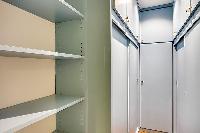 spacious closet in a 1-bedroom Paris luxury apartment