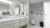 clean toilet and bath in Saint Barth Villa Au Coeur Du Rocher luxury holiday home, vacation rental