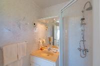 clean toilet and bath in Saint Barth Villa Les Acajous luxury holiday home, vacation rental