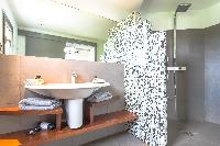 clean toilet and bath in Saint Barth Villa Datcha luxury holiday home, vacation rental