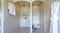 clean toilet and bath in Saint Barth Villa Au Rêve luxury holiday home, vacation rental