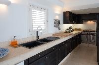 cool modern kitchen of Saint Barth Villa Gouverneur View luxury holiday home, vacation rental