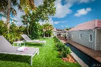 cool lawn of Saint Barth Villa Kaloo luxury holiday home, vacation rental