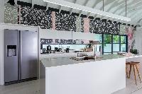 cool modern kitchen of Saint Barth Villa Rose Dog luxury holiday home, vacation rental