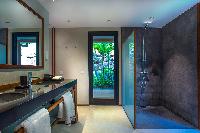 cool bathroom with rain shower in Saint Barth Villa Apache luxury holiday home, vacation rental