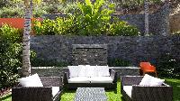 cool garden and patio of Saint Barth Villa Grace holiday home, vacation rental