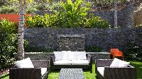 cool garden and patio of Saint Barth Villa Grace holiday home, vacation rental