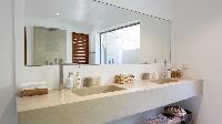 clean toilet and bath in Saint Barth Villa Ixfalia luxury holiday home, vacation rental