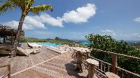 awesome poolside deck of Saint Barth Villa Ixfalia luxury holiday home, vacation rental