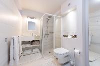 spotless toilet and bath in Saint Barth Villa Rose Dog Estate holiday home, luxury vacation rental