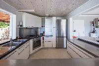 cool modern kitchen of Saint Barth Villa Mapou luxury holiday home, vacation rental