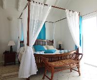 cool canopy bed in Saint Barth Villa Aquamarine luxury vacation rental