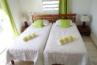 clean bedroom linens in Saint Barth Villa Aquamarine luxury vacation rental