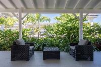 cool patio and garden of Saint Barth Villa Wild Blue luxury holiday home, vacation rental