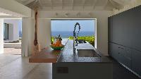 cool modern kitchen of Saint Barth Villa Casa Del Mar luxury holiday home, vacation rental
