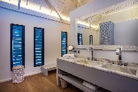 cool double-sink bathroom vanity in Saint Barth Villa Aqua luxury holiday home, vacation rental