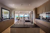 cool kitchen island in Saint Barth Villa Aqua luxury holiday home, vacation rental