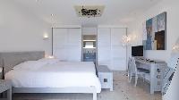 crisp bedroom linens in Saint Barth Villa Prestige holiday home, luxury vacation rental