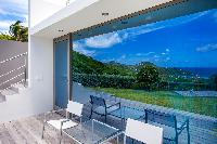 cool glass wall of Saint Barth Villa Nirvana holiday home, luxury vacation rental