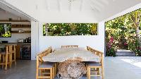 cool dining room of Saint Barth Villa Coco Rock luxury holiday home, vacation rental