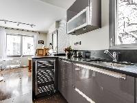 up-to-date open kitchen in a 1-bedroom Paris luxury apartment