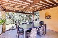 lovely outdoor dining at Cannes - Palm Spring Villa luxury apartment