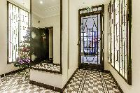 entrance with a wardrobe in Paris luxury apartment