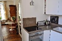 modern well-equpped kitchen in Paris luxury apartment