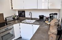 modern well-equpped kitchen in Paris luxury apartment