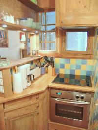 wooden countertop kitchen in Paris luxury apartment