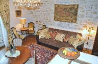 distinctively warm, authentic, and gorgeous 1-bedroom Paris luxury apartment with exposed beams and 