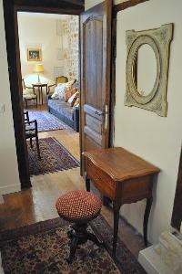 distinctively warm, authentic, and gorgeous 1-bedroom Paris luxury apartment with exposed beams and 