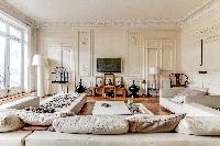 elegant 4-bedroom Paris luxury apartment with high ceilings and long windows