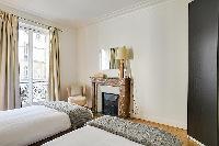 pristine pillows and bed sheets in République - Voltaire luxury apartment