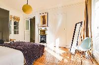 cheerful bedroom in République - Voltaire luxury apartment