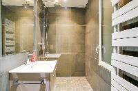 dapper bathroom interiors of République - Voltaire luxury apartment