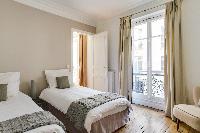 serene and snug bedroom in République - Voltaire luxury apartment