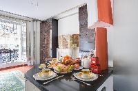 well-ventilated dining area in a 2-bedroom Paris luxury apartment