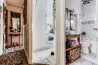 bathroom, hallway and kitchen in a 1-bedroom Paris luxury apartment