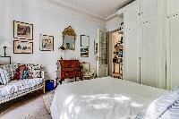 beautiful and well-appointed bedroom in 3-bedroom Paris luxury apartment