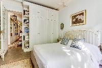 beautiful and well-appointed bedroom in 3-bedroom Paris luxury apartment