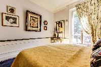 beautiful and well-appointed bedroom in 3-bedroom Paris luxury apartment