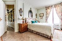 master bedroom fitted with a king size bed, and en suite bathroom with tub, and a boudoir in 3-bedro