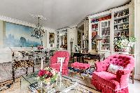 massively decorated living room in 3-bedroom Paris luxury apartment