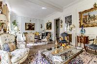 massively decorated living room in 3-bedroom Paris luxury apartment